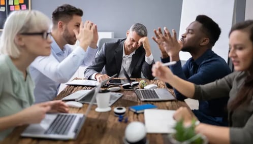 Stressful situation in a business meeting, people arguing with each other