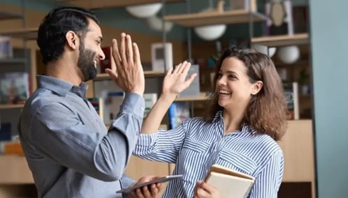 Two People Celebrating at work